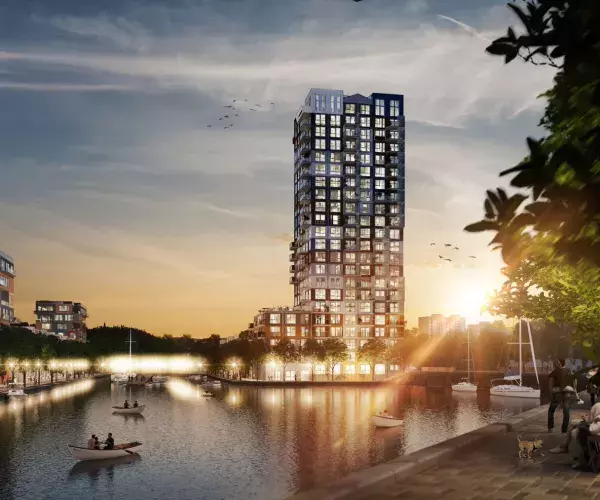 Foto van woontoren Hoge Vrijheid in de zonsondergang 